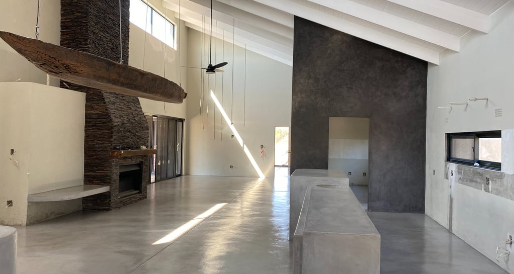 Modern minimal seamless floor and wall finishes by Tswanacrete Botswana.