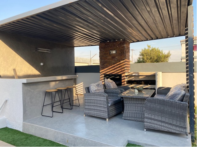 Cretecote nickle grey entertainment countertop and floors for elegant cement finishes installed by Tswanacrete Botswana.