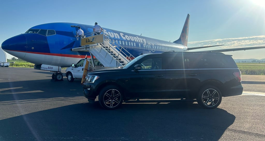 emilios Limo parked on the tarmac at an airport