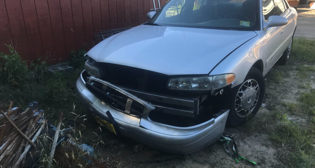 Car with bumper and frame damge