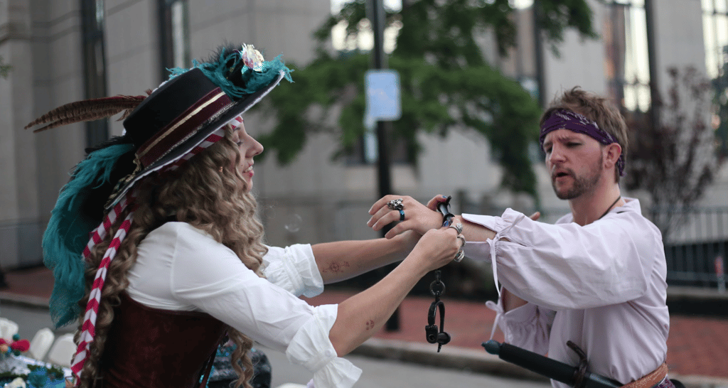 Pirates playing with a bracelet craft