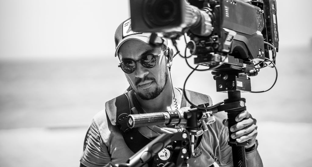 Jonathan Calero operating steadicam in black and white