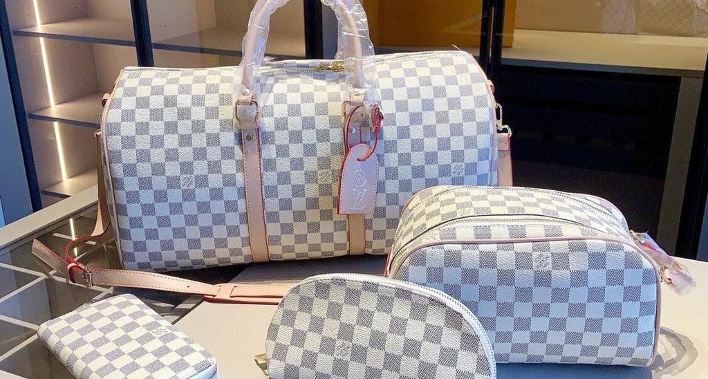 a set of three pieces of luggage bags