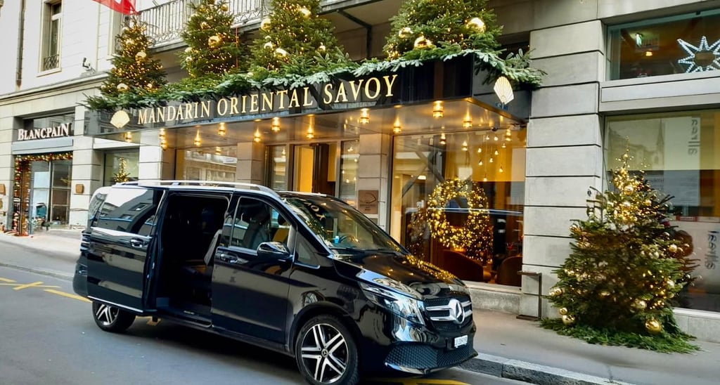 Luxury private chauffeur Mercedes V Class in front of Mandarin Oriental Savoy Zurich