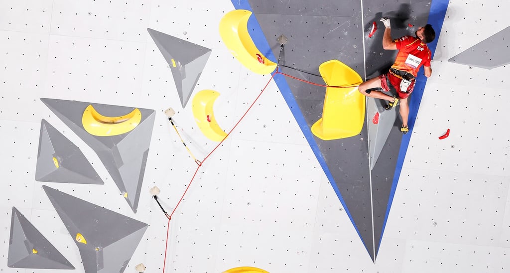 a man lead climbing 