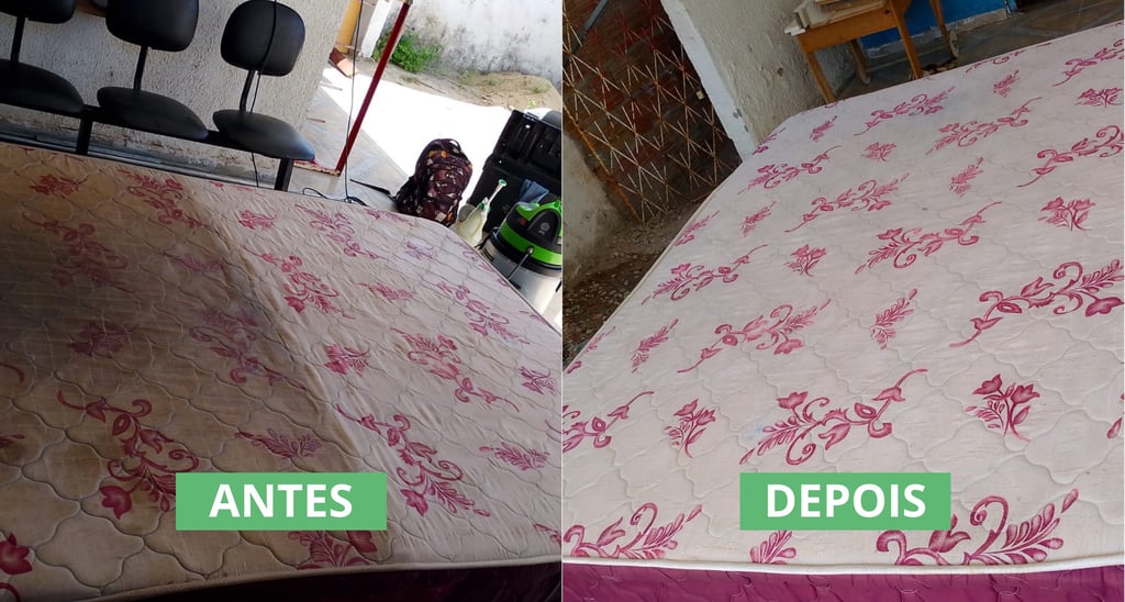 a bed with a mattress and a suitcase