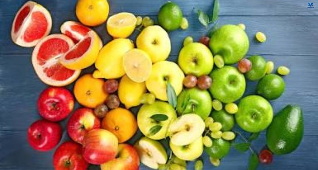 Fresh raspberries, grapefruit halves and avocado arranged as diabetes friendly fruits.