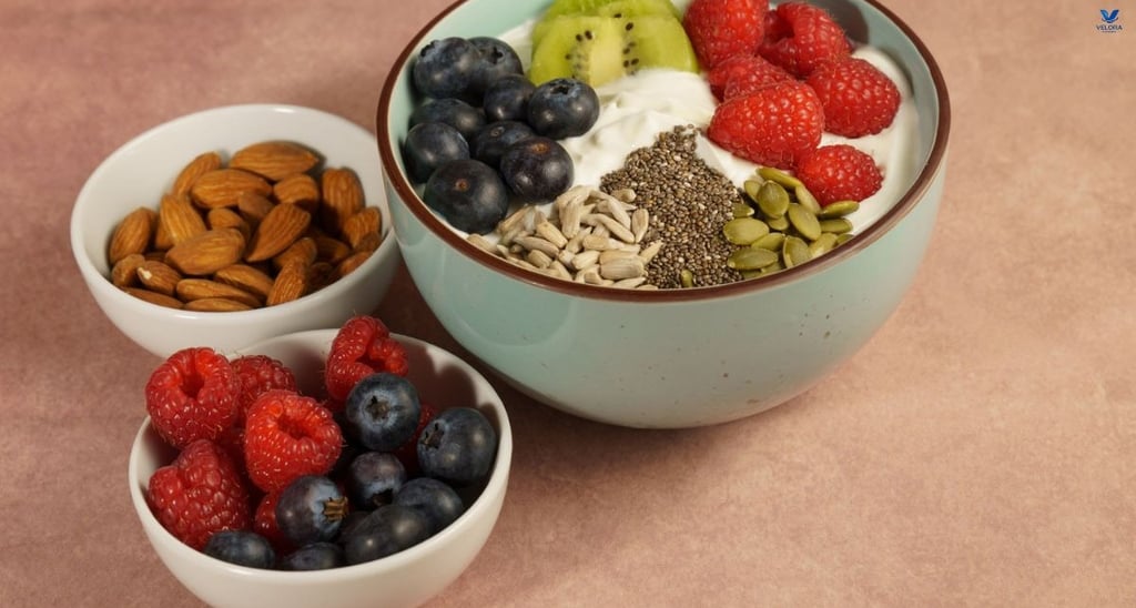Balanced breakfast with Greek yogurt, blueberries, kiwi, and almonds for a healthy blood sugar.