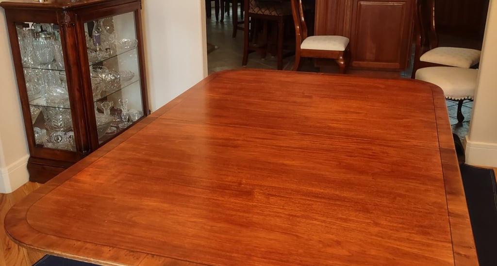 Restored vintage maple dining table. Was in the back yard for 10 years.