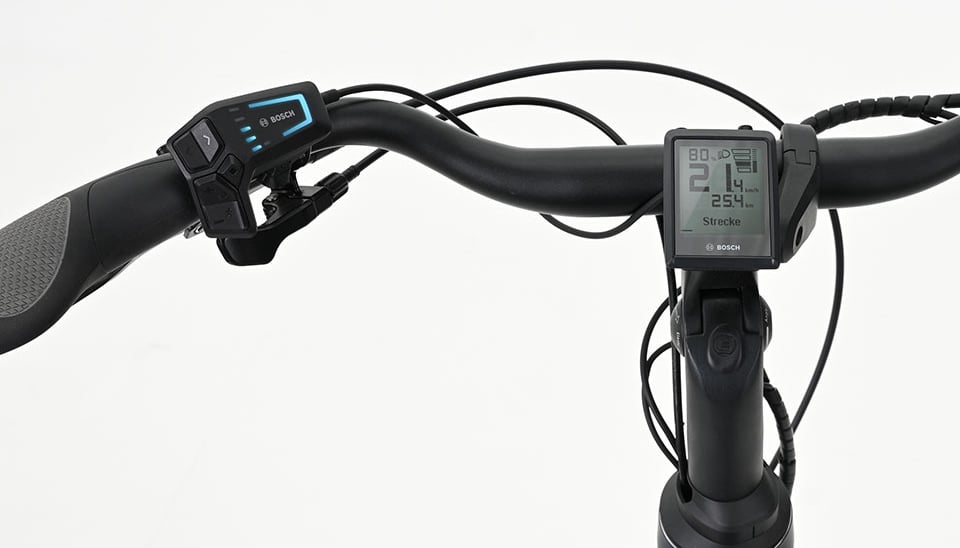 Bosch electric bike handlebar featuring a digital Intuvia display and LED remote control system.