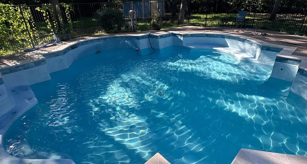 New plaster on a pool with cracks that were repaired