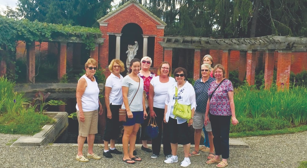 a group of people standing in front of a building