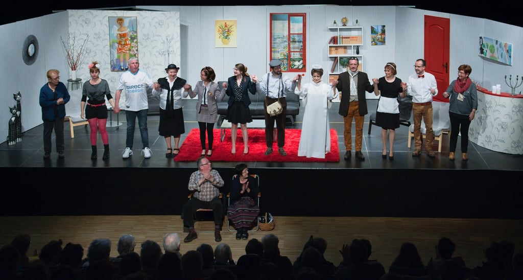 a group of people standing on a stage