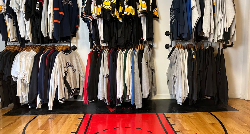 In this picture, there are football jerseys Steeler jerseys Broncos sweater, Raiders sweater