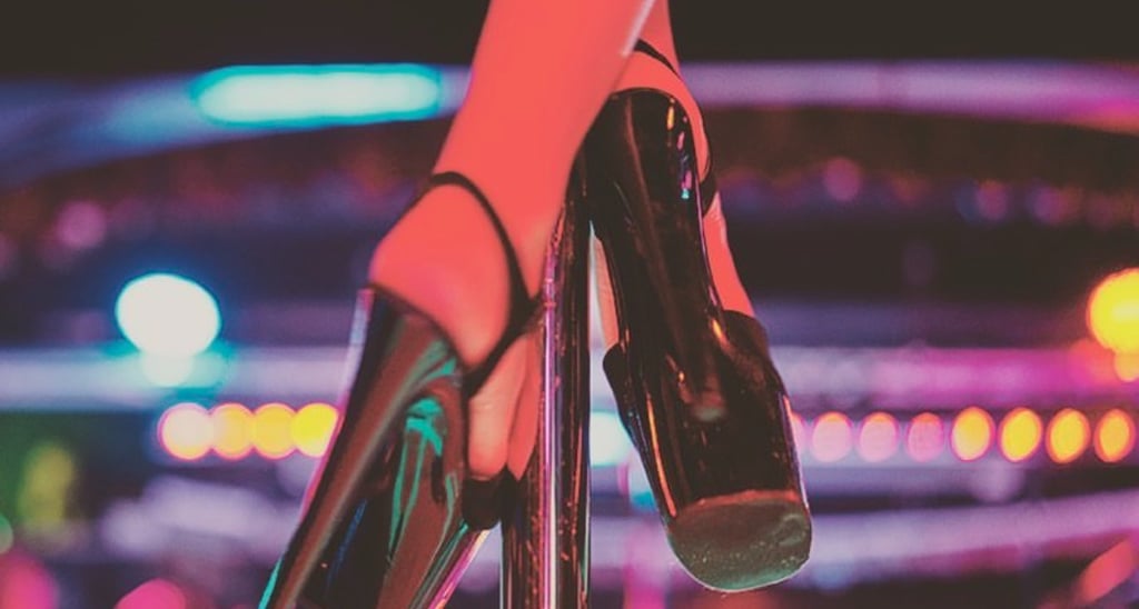 a woman's legs in high heels and heels