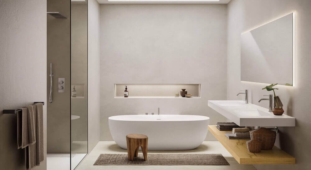 Moderne badkamer met ligbad en lavabo, gerealiseerd door bij een badkamerrenovatie regio Leuven