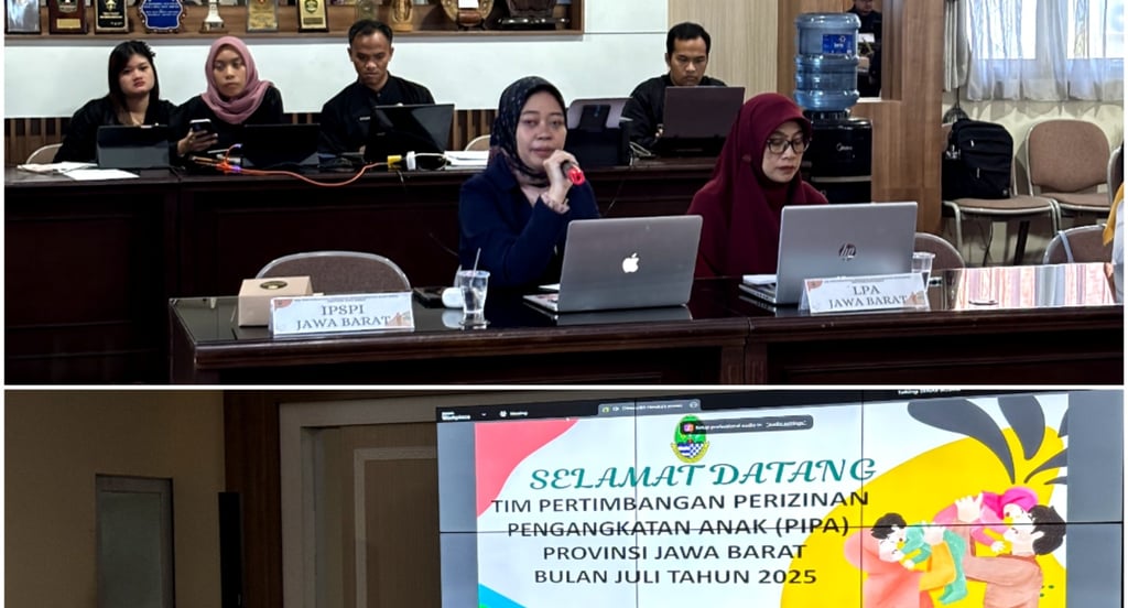 a group of people sitting at a table with laptops