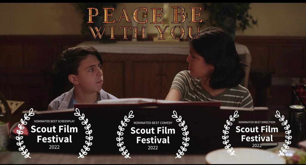 a woman and a man sitting at a piano