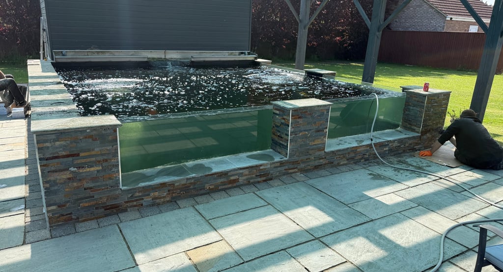 4x big windows installed and outside tiled garden ponds