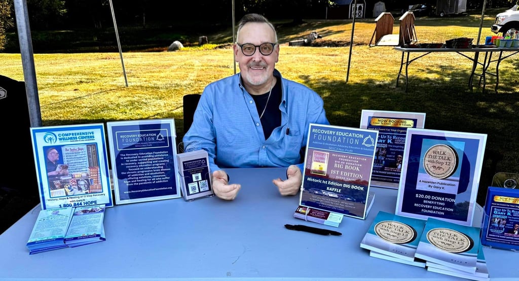 Gary K at Sober Fest MI selling books and raffle tickets