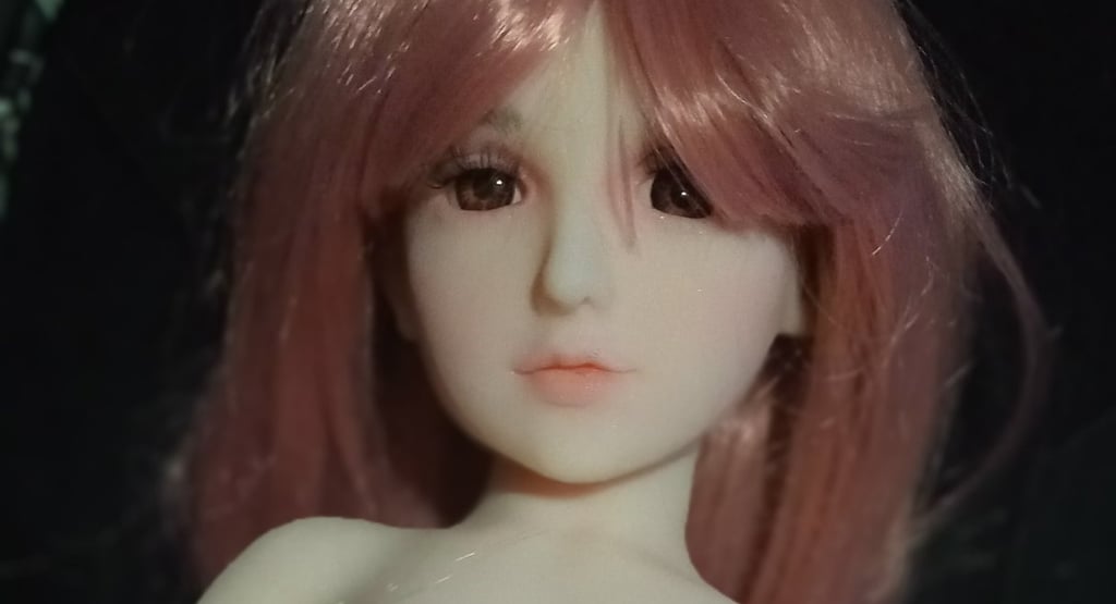 sex doll with breasts exposed