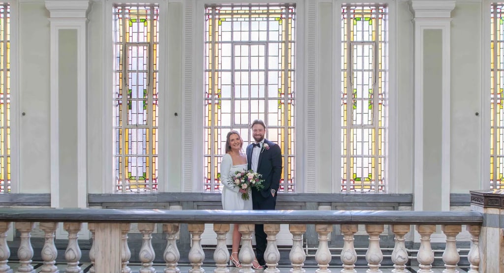 wedding couple standing in Islington Town Hall