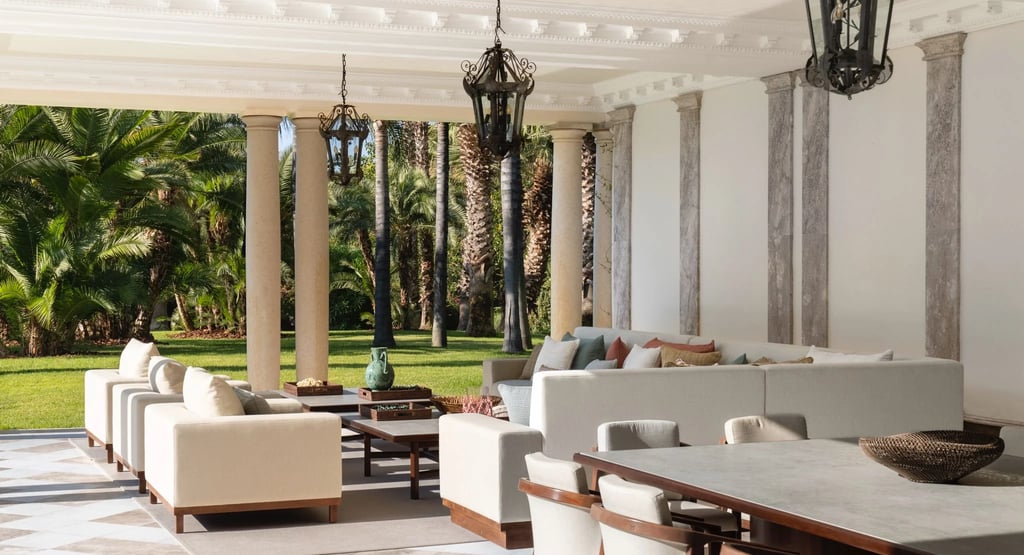 Covered terrace dining area overlooking gardens