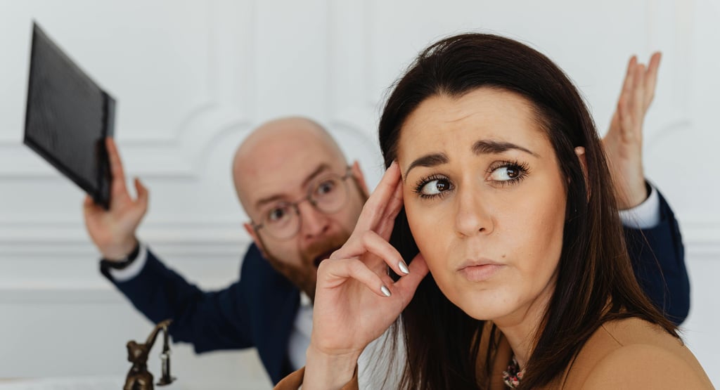 a man counselor yelling at a woman who is in drug rehab