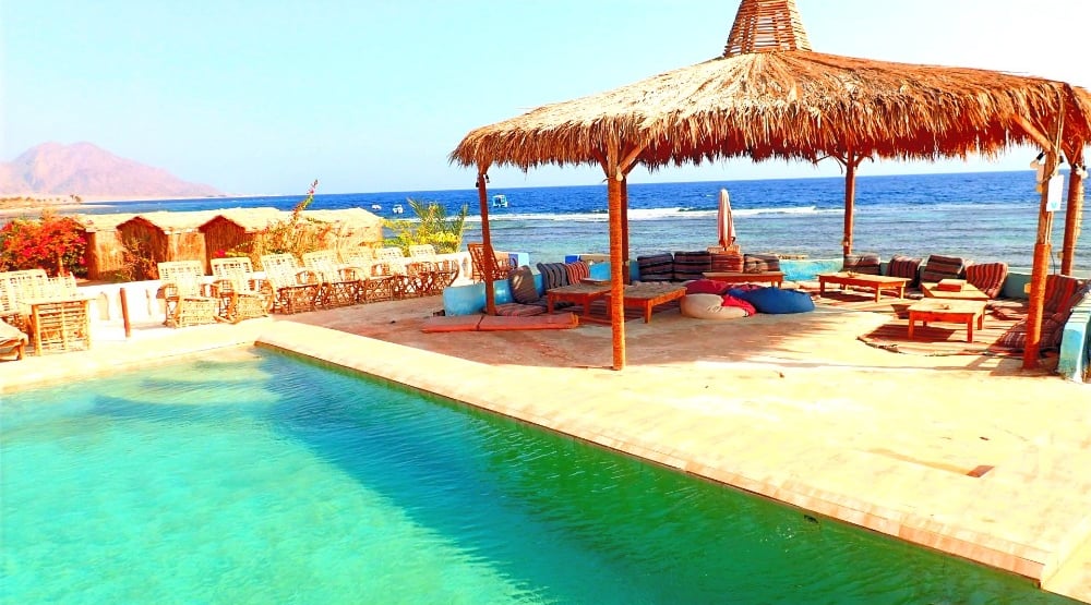 Bedouin Star pool, seating area and husha rooms in Ras Shitan: Direct view of the Red Sea.