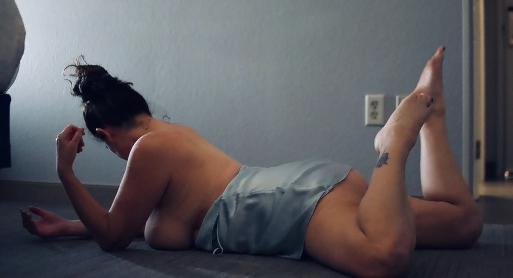 Jennadea in a light blue satin slip