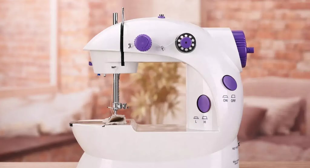 Mini máquina de costura portátil