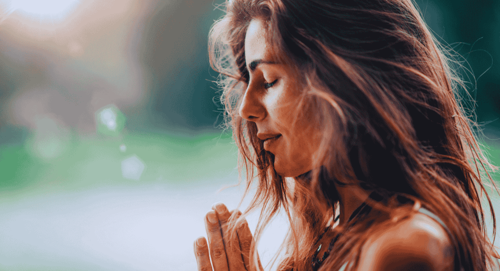 a woman in focused on deep meditation