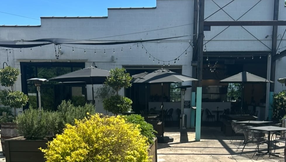 patio of neuse river brewing