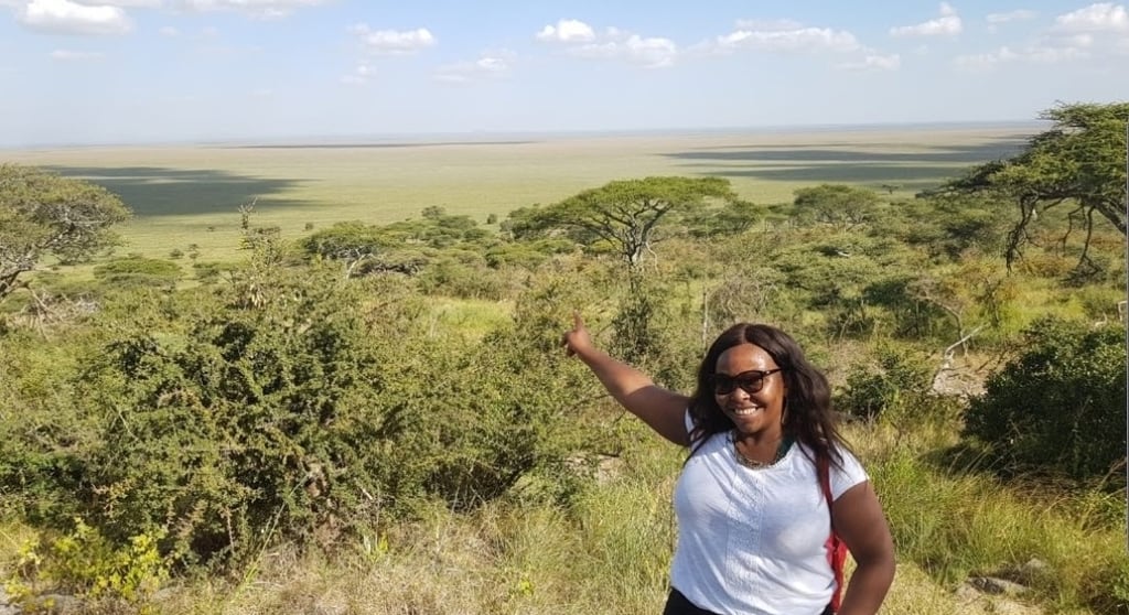 A lady surrounded by Serengeti plains