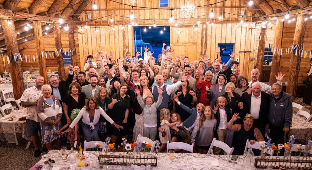 Friends and family at Wedding Reception in Barn