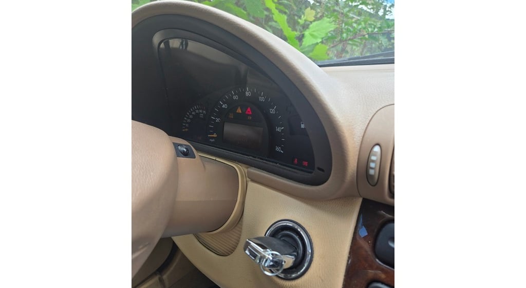 Car key in ignition of a 2003 Mercedes - car locksmith service