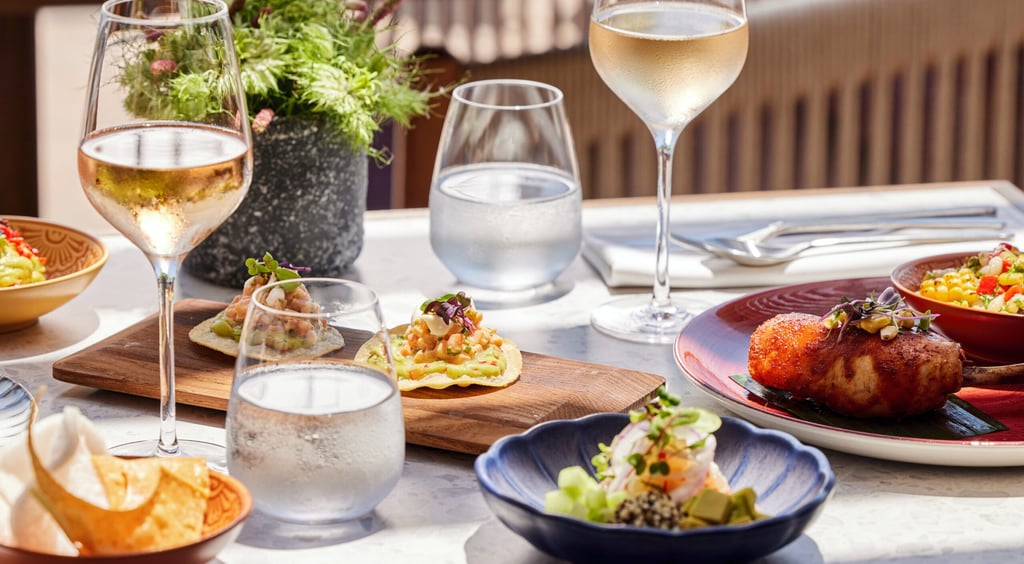 Gourmet appetizers and rose wine served on a sunny outdoor restaurant at Ikos Kissamos