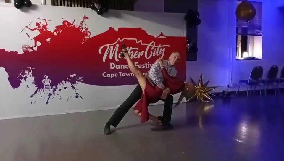 A couple performs a ballroom dance dip at the Mother City Dance Festival in Cape Town.