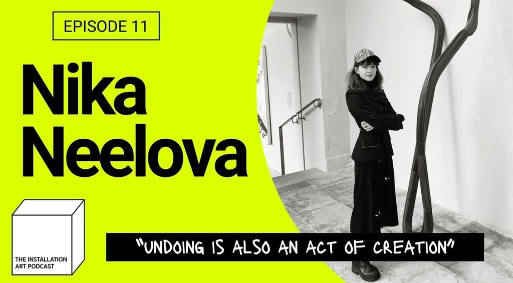 Artist Nika Neelova with her work