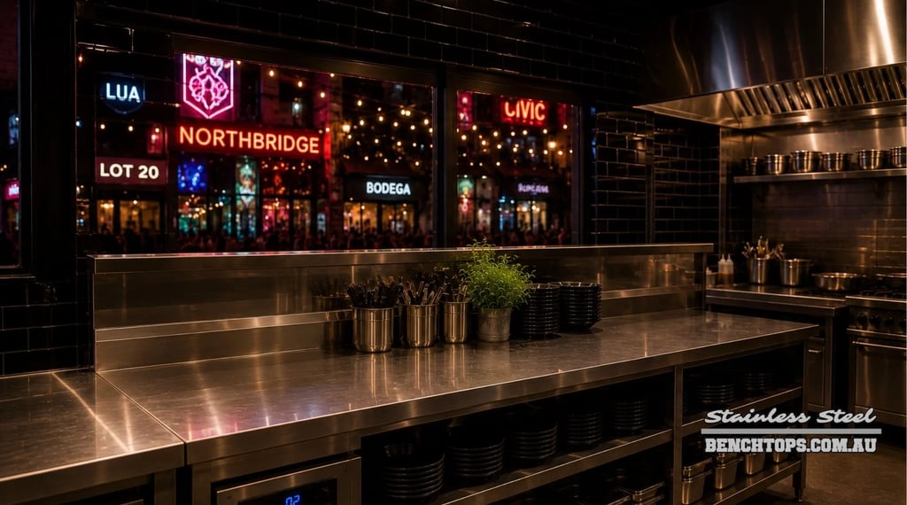 Heavy-duty kitchen work counter and durable stainless steel bench Northbridge at night.