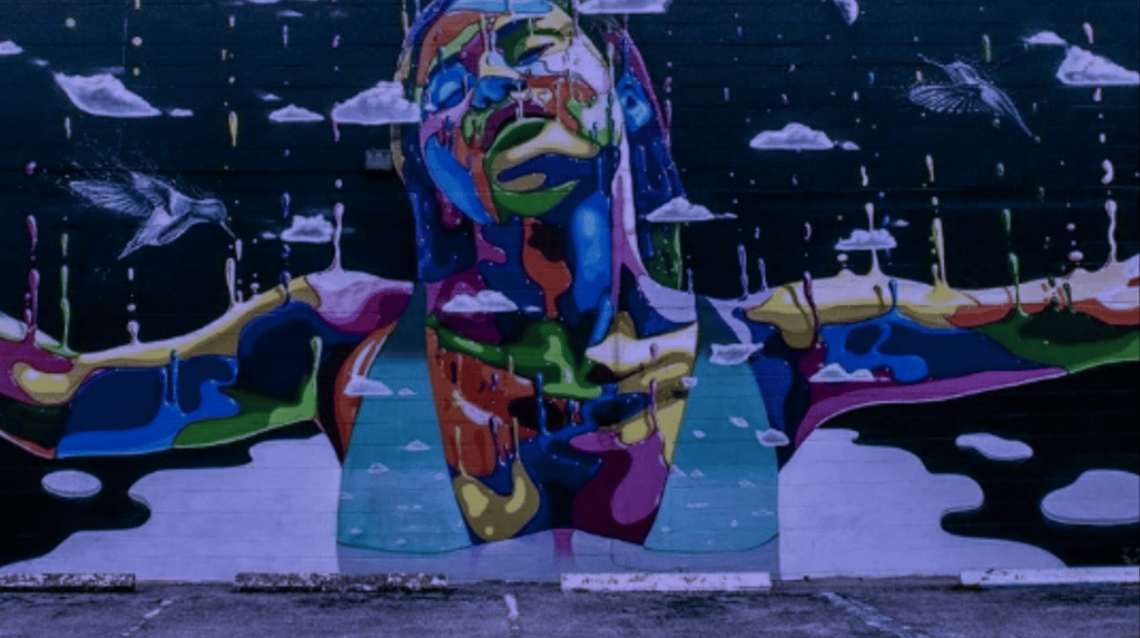 a colorful mural of a woman's face in downtown St. Petersburg FL