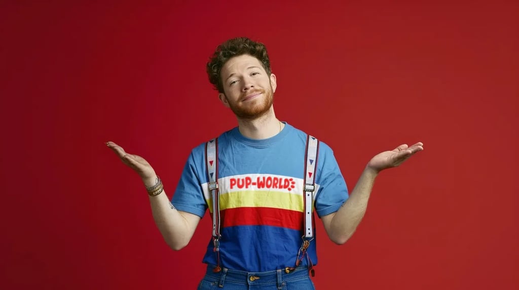 Red haired young man in tshirt and suspenders