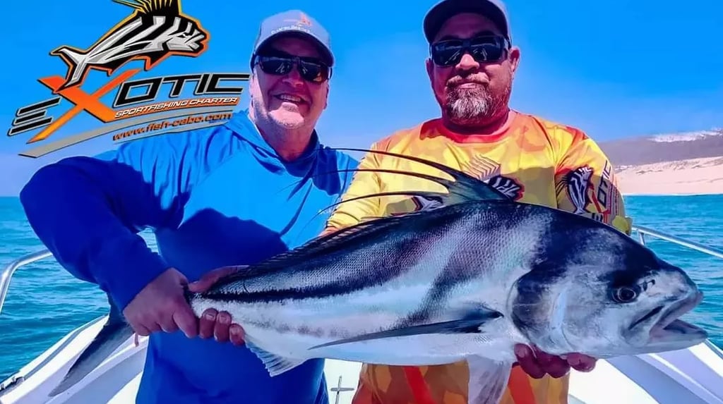 two men holding a fish on a boat