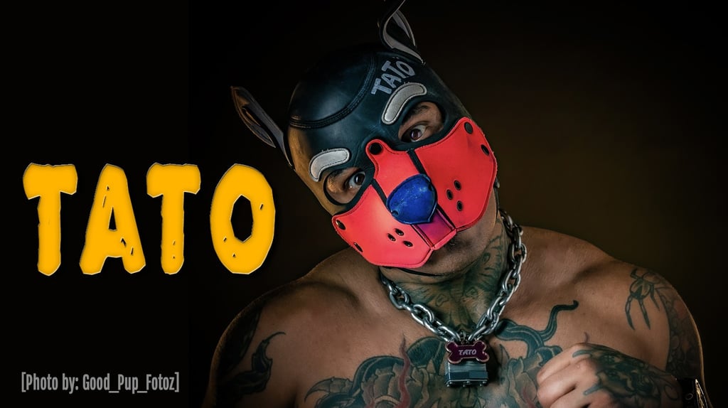 A man in his pup mask. "TATO"