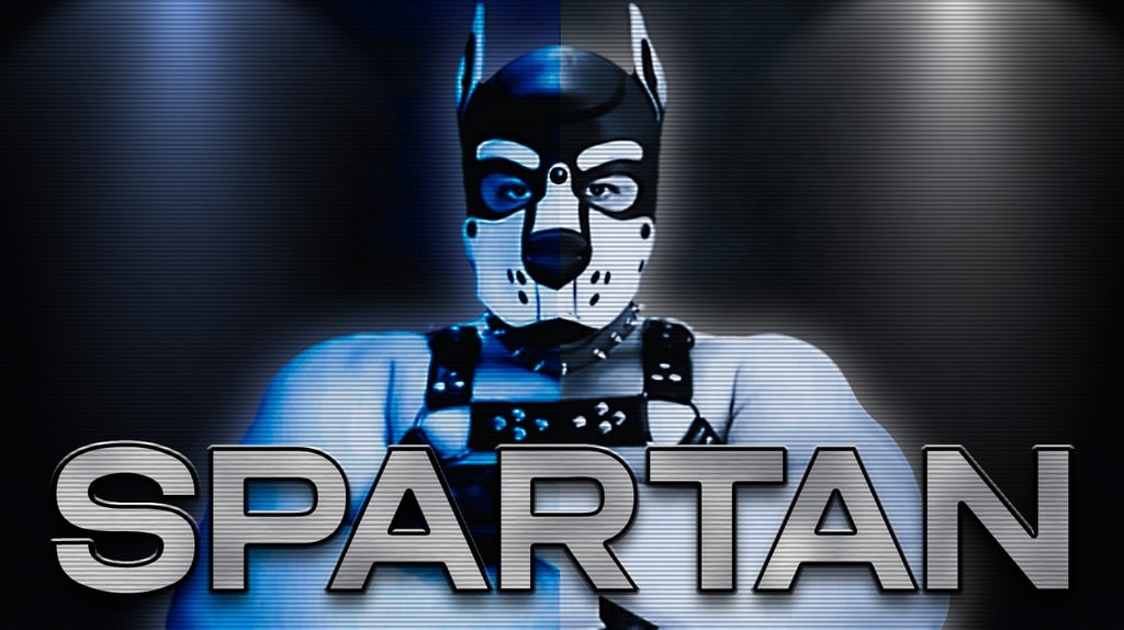 A man in a dramatic pose wearing a pup mask. Name plate: SPARTAN.