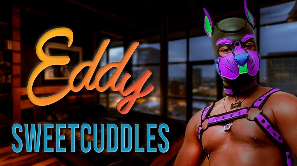 Man in pup hood on a name header. Eddy Sweetcuddles
