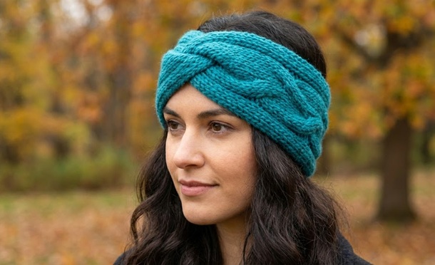 Woman wearing kniitted ear warmer