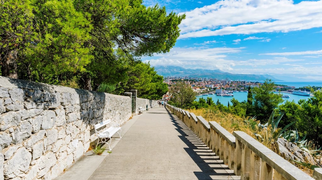 Scenic walking path on Marjan Hill overlooking the city and harbour of Split