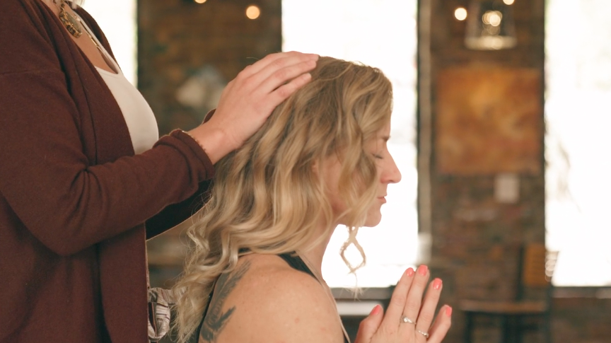 woman receiving energy healing