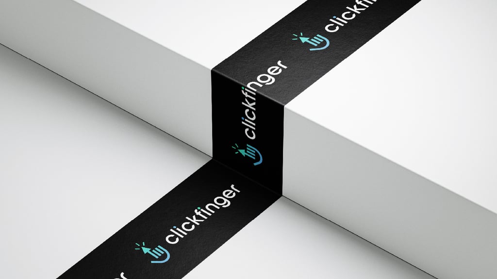 Black custom packing tape with hand icon marketing agency logo.